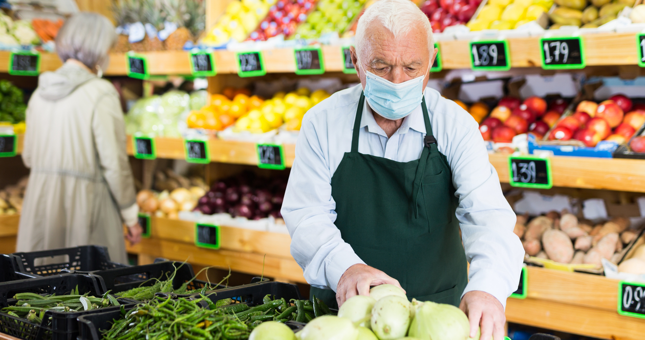 Elderly shop worker