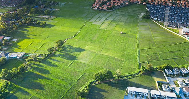 Green belt land with housing development creeping in on the edges