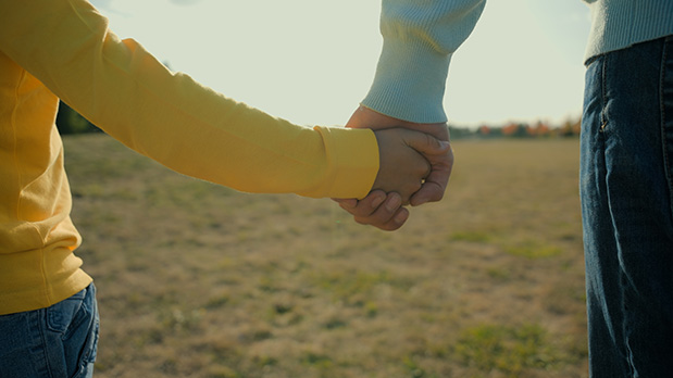 child holding hands