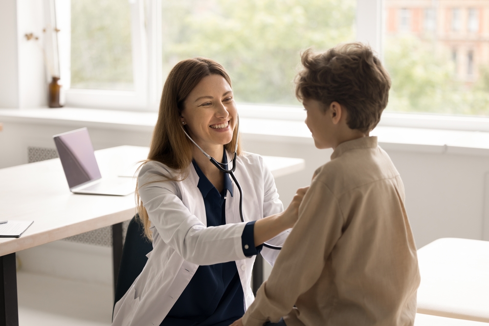 Paediatrician and little boy patient